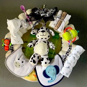 Baby wreath Dalmatian puppy with black and white accessories. Very cute